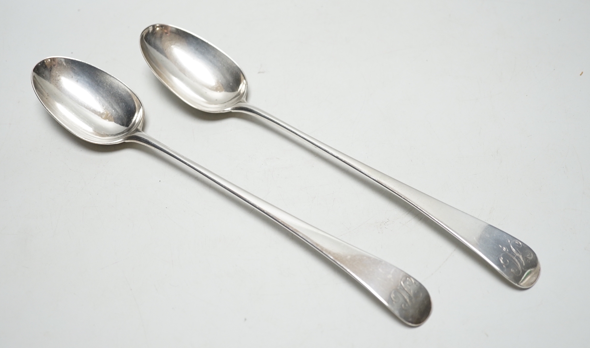 A pair of George III Old English pattern base marked basting spoons, London 1771?, 30cm, 7oz.